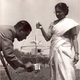 Mani and a colleague work on a radiosonde, a balloon-borne weather-measuring equipment.